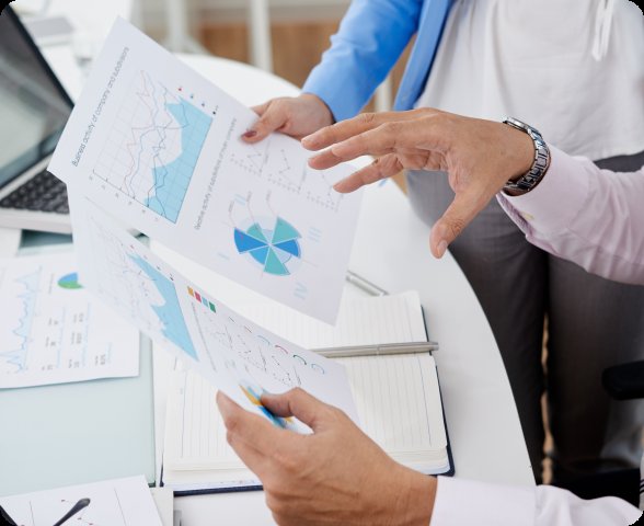Healthcare administrators reviewing financial charts — revenue operations